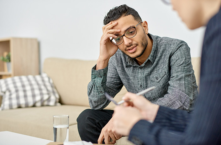 Young man with ADHD in therapy session