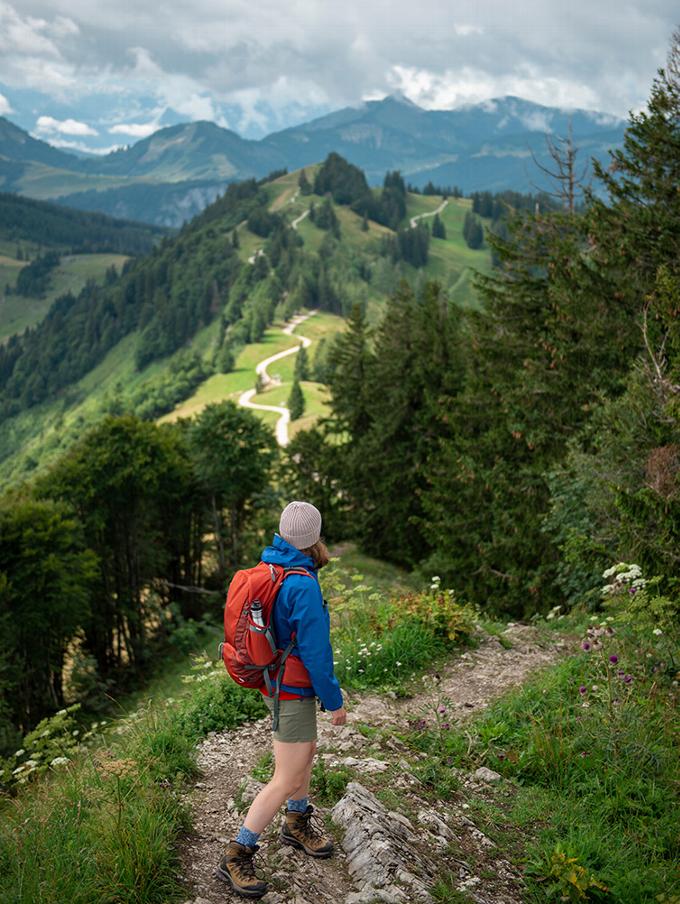 Hiking woman looking out at mountainous view